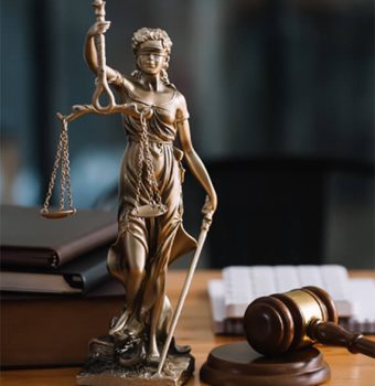 statue-of-lady-justice-on-desk-of-a-judge-or-lawye-SVECXT5-intro.jpg